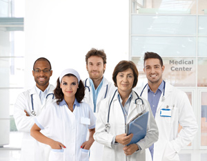 Photo shows 5 providers in white lab coats.
